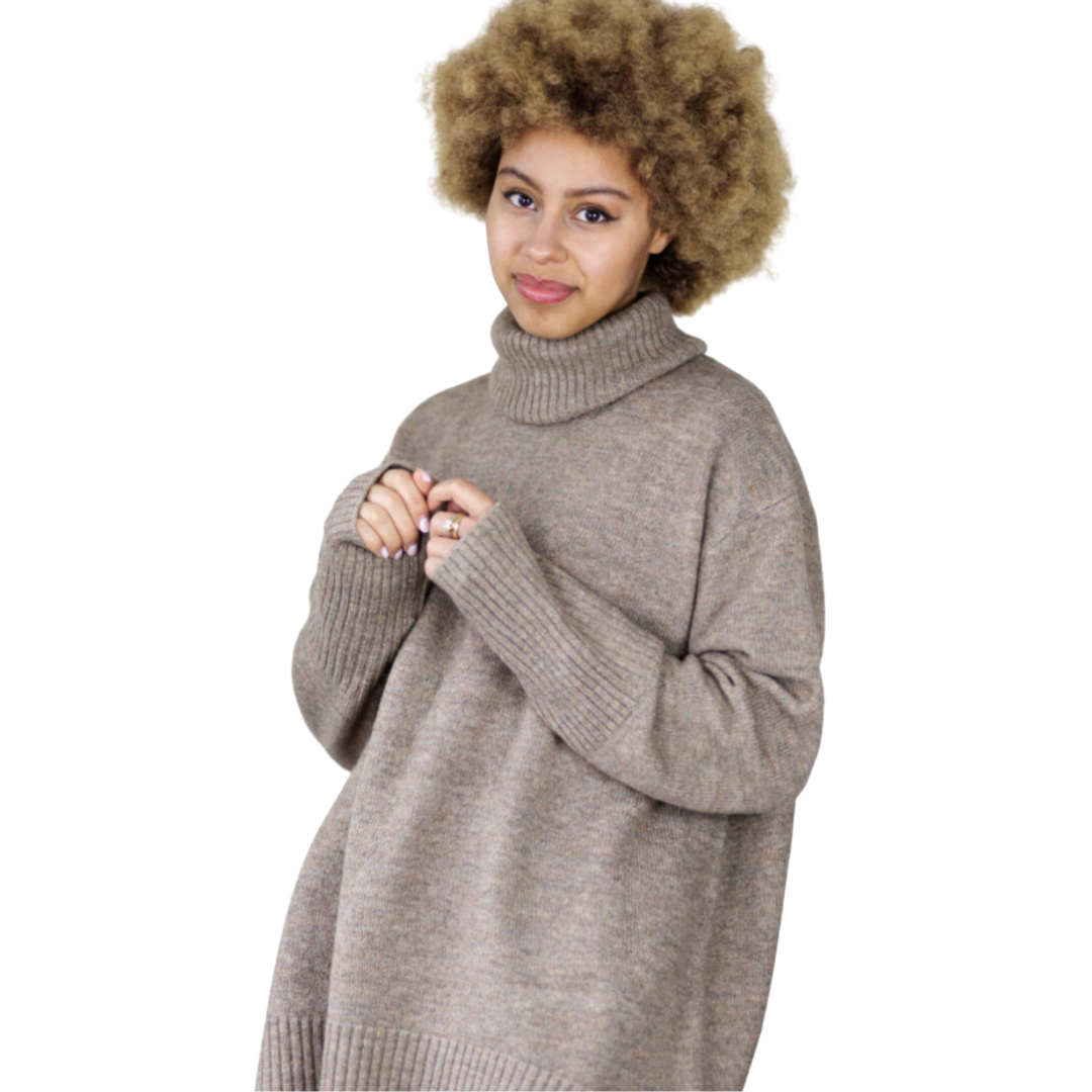 Hannah's Of Erin - Erin Ontario - Boutique - Echo Verde - Dog walker Sweater - Colour Almond. Cozy O/s Pullover, Cowl Neck, ribbed cowl, cuffs, hemline. Hi - Low Hemline. Our famous Dog Walker Sweater is back! A fall must-have in beautiful soft recycled yarns. Our number one best seller! Get yours before they sell out! Blend of Acrylic/Recycled Polyester/Spandex