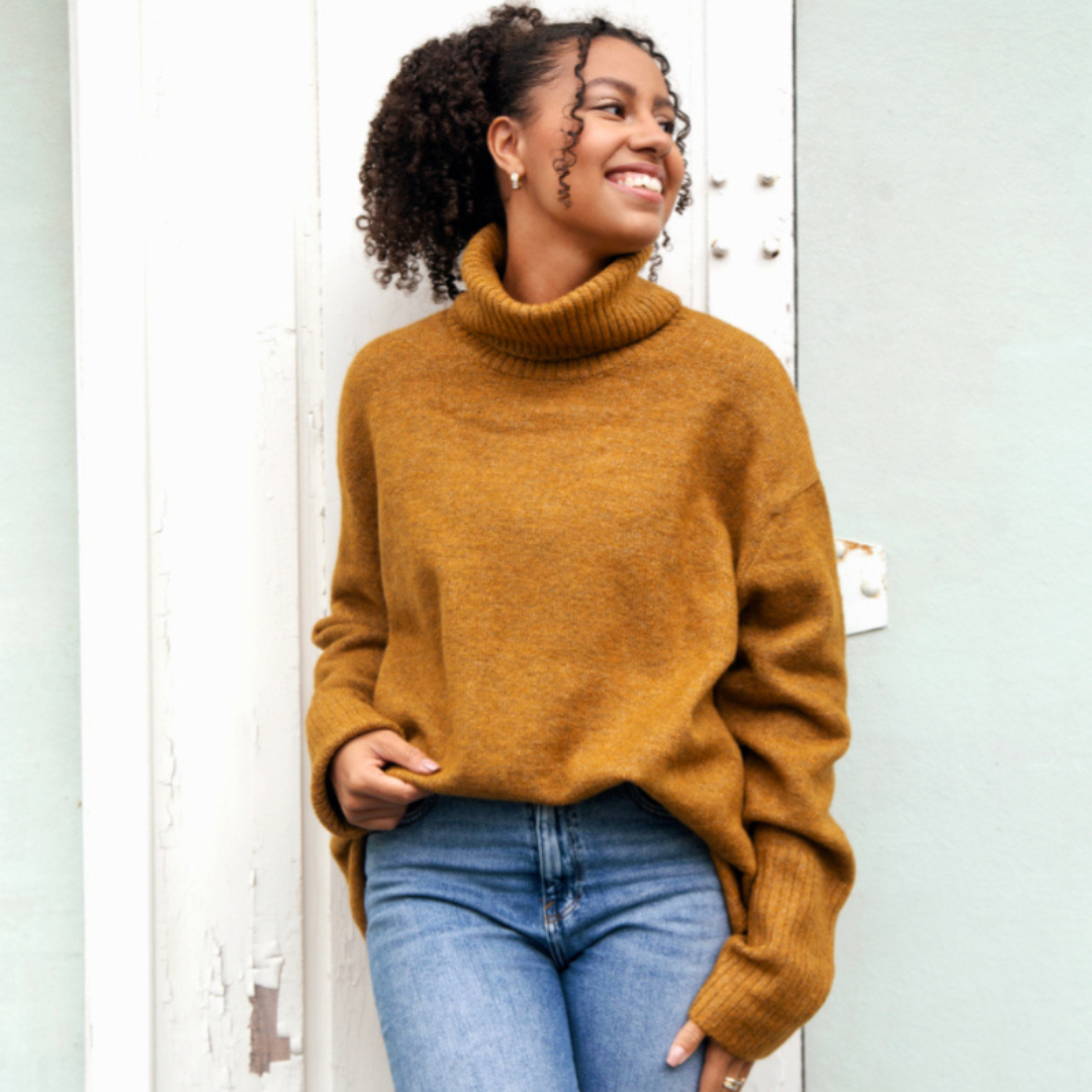 Hannah's Of Erin - Erin Ontario - Boutique - Echo Verde - Dog walker Sweater - Colour Bronze. Cozy O/s Pullover, Cowl Neck, ribbed cowl, cuffs, hemline. Hi - Low Hemline. Our famous Dog Walker Sweater is back! A fall must-have in beautiful soft recycled yarns. Our number one best seller! Get yours before they sell out! Blend of Acrylic/Recycled Polyester/Spandex
