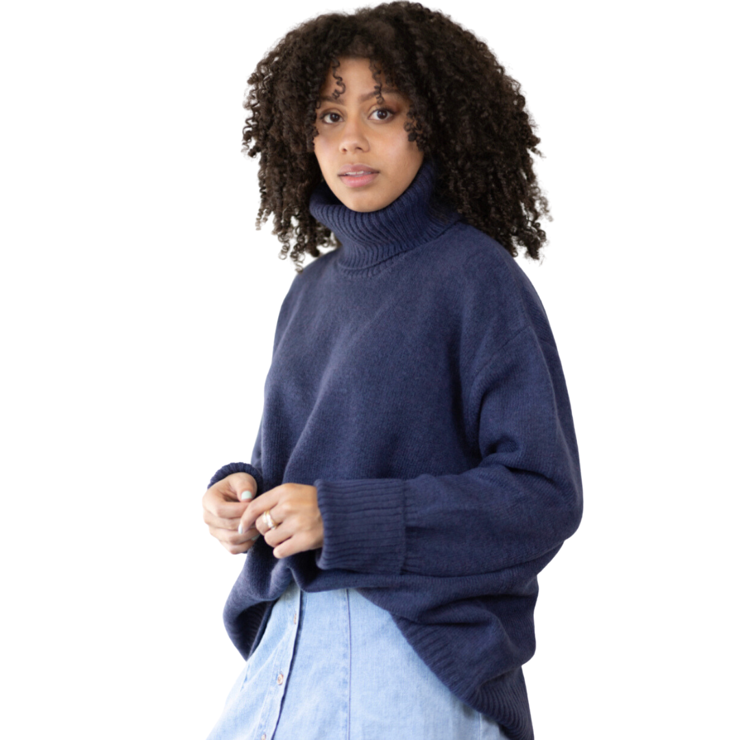 Hannah's Of Erin - Erin Ontario - Boutique - Echo Verde - Dog walker Sweater - Colour Navy. Cozy O/s Pullover, Cowl Neck, ribbed cowl, cuffs, hemline. Hi - Low Hemline. Our famous Dog Walker Sweater is back! A fall must-have in beautiful soft recycled yarns. Our number one best seller! Get yours before they sell out! Blend of Acrylic/Recycled Polyester/Spandex