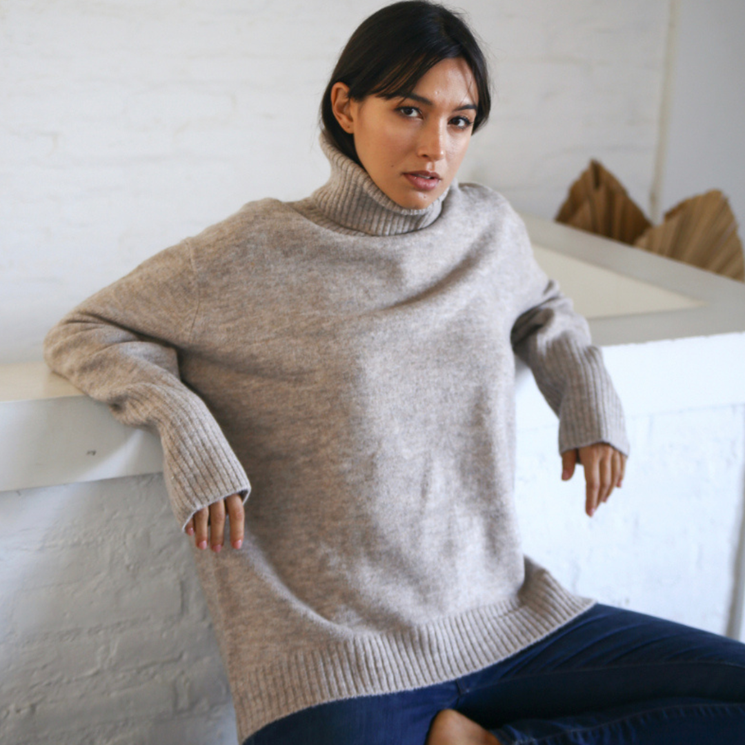 Hannah's Of Erin - Erin Ontario - Boutique - Echo Verde - Dog walker Sweater - Colour Oat. Cozy O/s Pullover, Cowl Neck, ribbed cowl, cuffs, hemline. Hi - Low Hemline. Our famous Dog Walker Sweater is back! A fall must-have in beautiful soft recycled yarns. Our number one best seller! Get yours before they sell out! Blend of Acrylic/Recycled Polyester/Spandex