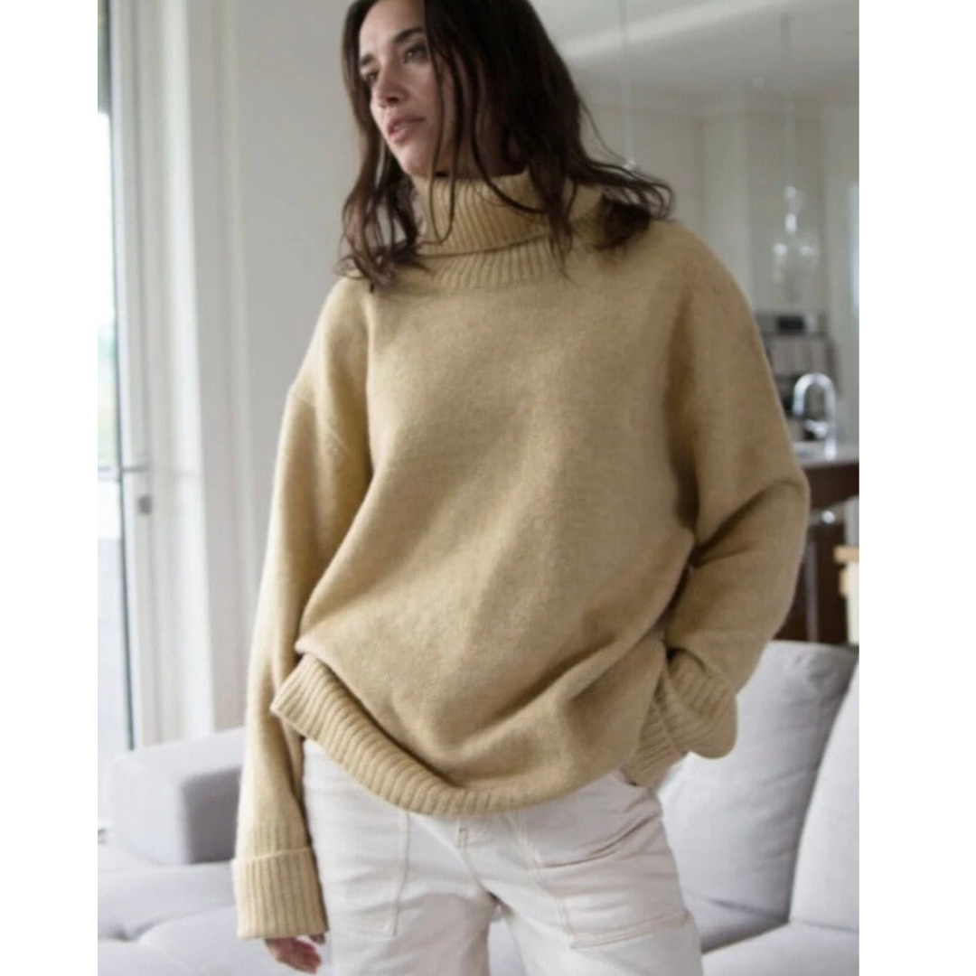 Hannah's Of Erin - Erin Ontario - Boutique - Echo Verde - Dog walker Sweater - Colour Wheat. Cozy O/s Pullover, Cowl Neck, ribbed cowl, cuffs, hemline. Hi - Low Hemline. Our famous Dog Walker Sweater is back! A fall must-have in beautiful soft recycled yarns. Our number one best seller! Get yours before they sell out! Blend of Acrylic/Recycled Polyester/Spandex