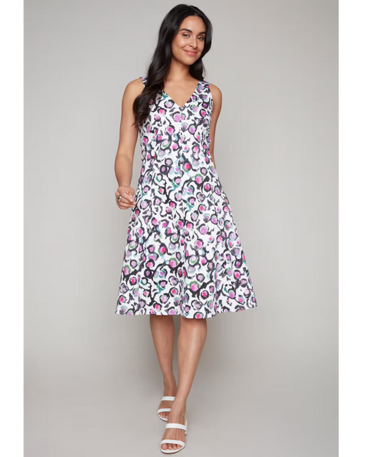 Hannahs_Of_Erin-Erin_Ontario-Compli_K-A-lineDress Style 33910.
Sleeveless A-line dress with a V-neckline and knee-length hem. Features a playful abstract floral print in pink, green, and black on white. Made from a breathable blend of 97% cotton and 3% spandex for light structure and gentle stretch.