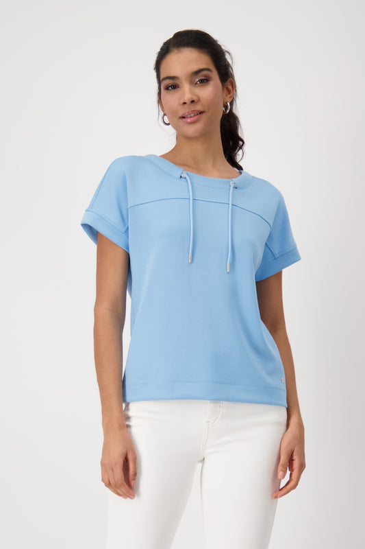 Hannahs_Of_Erin-Erin_Ontatio-Monari-S_S_BANU_SWEAT_SHIRT-Sky Blue. Monari soft-touch sweatshirt in stretch modal blend, featuring a stand-up collar with metal grommet drawstring, short dropped sleeves, and a relaxed silhouette