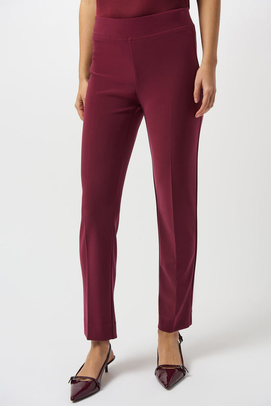 Hannahs Of Erin | Erin Ontario |Joseph Ribkoff |Classic Straight Pant-Merlot.Joseph Ribkoff Classic Straight Pant in rich Merlot, pull-on design with covered elastic waistband, silky knit fabric, straight-leg silhouette, and discreet back hem slits for ease of movement. Unlined and lightweight for versatile day-to-night wear