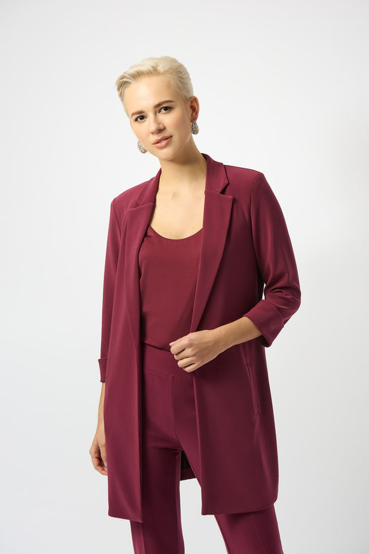 Hannahs Of Erin| Erin Ontario | Joseph Ribkoff | Long Open Front Blazer – Merlot |Joseph Ribkoff long open front blazer in rich merlot with notched collar and three-quarter cuff sleeves, made from breathable interlock twist yarn fabric, perfect for workwear and evening events.