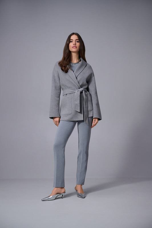 Hannahs Of Erin | Erin Ontario |Joseph Ribkoff | melange silky knit boxy top with scoop neckline| colour Grey, three-quarter dolman sleeves, side knot detail, and wide waistband, designed for a flattering and comfortable office chic look.