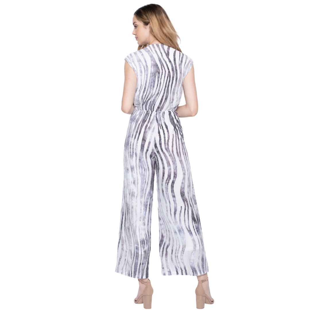 Hannahs Of Erin - Erin Ontario - The Picadilly Jumpsuit is a stunning alternative to a dress. It features a beautiful abstract print, top accentuated with button detail and Tie at waistband, wide leg bottoms, sleeveless with bra friendly straps, pockets. Grey print on white fabric