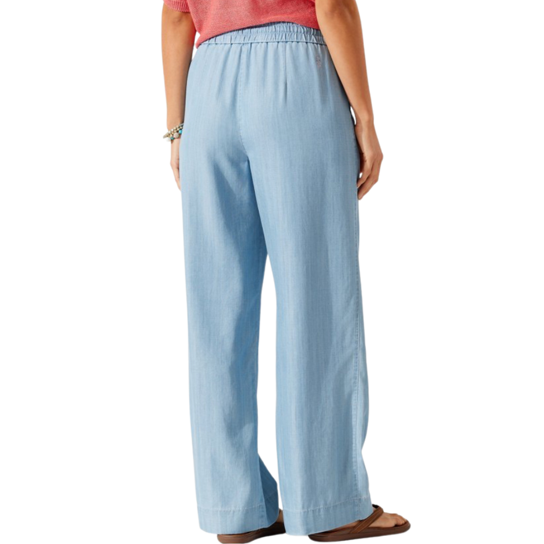 Hannahs Of Erin - Erin Ontario Product: Tommy Bahama All Day Easy Pant SW120941 Features: High-rise, wide-leg design. Relaxed fit with a drawstring waistband. Ensures comfort and versatility for everyday adventures. Material: Made from sustainable fibers, 100% TENCEL™ Lyocell fabric. Color: Elegant chambray blue hue named "Storm." Purpose: Designed for all-day comfort and effortless style.