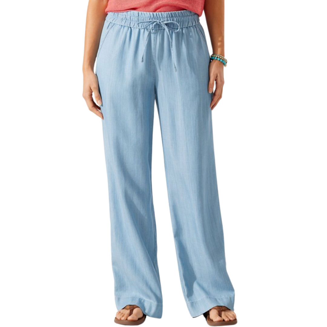 Hannahs Of Erin - Erin Ontario Product: Tommy Bahama All Day Easy Pant SW120941 Features: High-rise, wide-leg design. Relaxed fit with a drawstring waistband. Ensures comfort and versatility for everyday adventures. Material: Made from sustainable fibers, 100% TENCEL™ Lyocell fabric. Color: Elegant chambray blue hue named "Storm." Purpose: Designed for all-day comfort and effortless style.