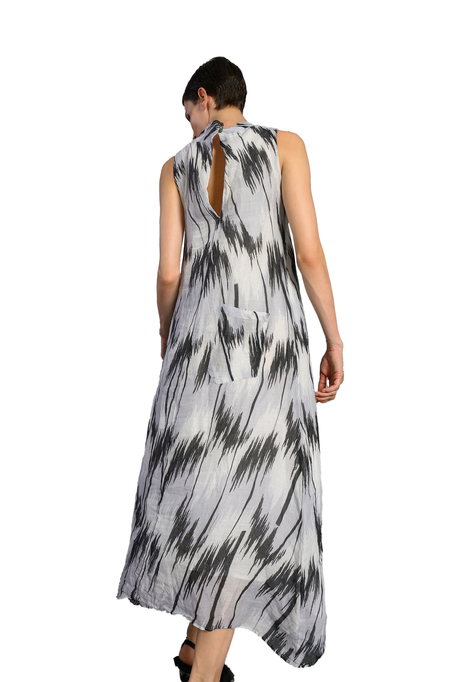 Hannahs Of Erin-Erin Ontario-Lotus Eaters-Maxi length Dress- design 23 Minias.

Abstract black and stone print

Sleeveless cut

High neckline for a modern, clean look

Keyhole back detail

Relaxed fit with fluid movement