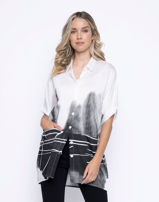 Hannahs Of Erin- Clothing Boutique- Erin Ontario-Picadilly-White-to-greyscale abstract ombre oversized shirt. Short sleeves, dropped shoulders, button front, and relaxed fit. Long silhouette for versatile styling. Wear as a lightweight jacket or buttoned up with a blazer and black pants for a polished office look.