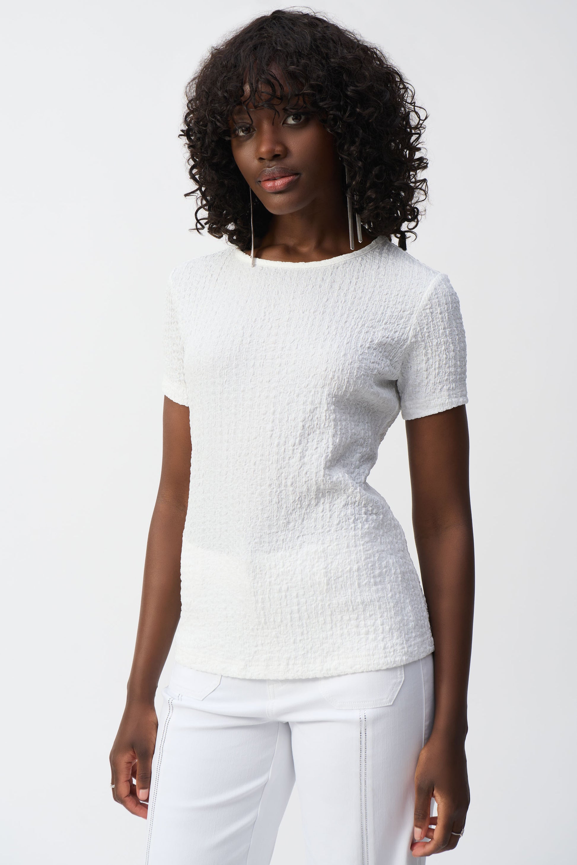 Hannahs Of Erin- Erin Ontario-Joseph Ribkoff Pullover – Effortlessly Chic & Comfortable
Soft 98% Polyester, 2% Spandex – Comfortable and stretchy  fabric.
Hip-Length Fit – Flattering and easy to pair with jeans, skirts, or trousers.
Classic Crew Neck – Timeless style detail.
Textured Fabric – Lightweight and adds subtle sophistication.
Versatile Design – Ideal for casual days, weekends, or office wear.
Soft & Stretchy – All-day comfort and flexibility. colour white 