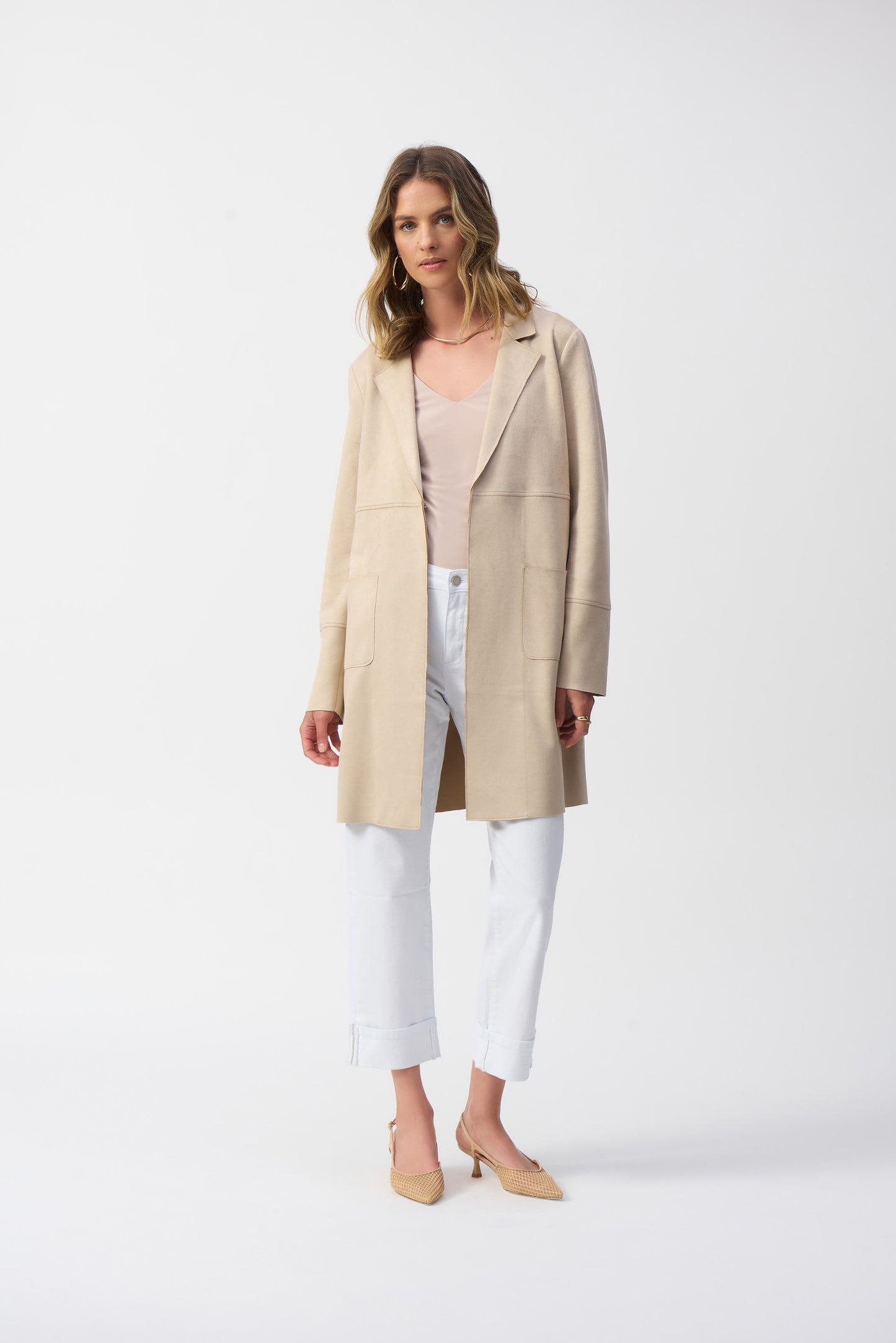 .Hannahs_Of_Erin-_Erin_Ontario-_Joseph_Ribkoff-_Single-Breasted_Overcoat-_Parchment_-251941, mid-length overcoat featuring a notched lapel, straight long sleeves, and practical front pockets. Designed for a regular fit, this minimalist coat is crafted from 95% polyester and 5% spandex, offering a polished, timeless style perfect for formal, office, or semi-formal occasions