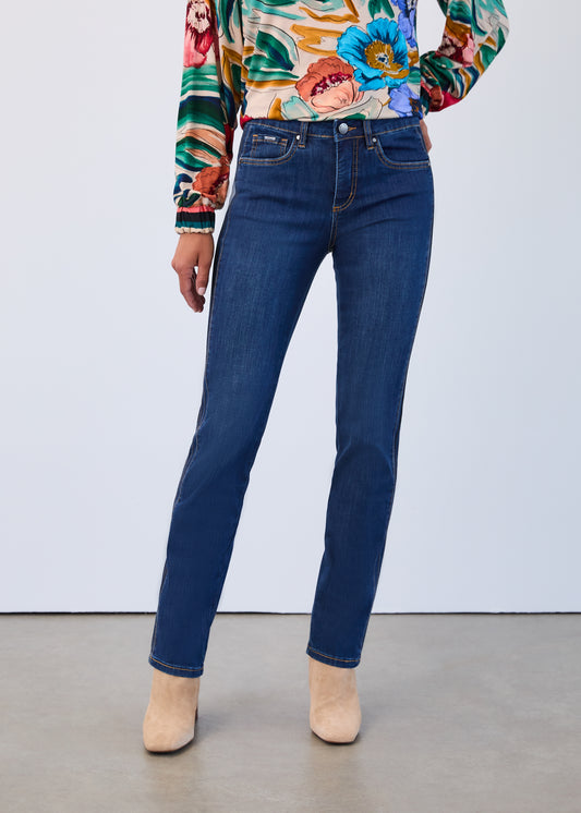 Hannahs Of Erin | Erin Ontario | FDJ | Olivia Mid-Rise Straight Leg Jeans.FDJ Olivia mid-rise women’s jeans in dark wash denim featuring a classic fly front fastening, five-pocket styling, subtle vertical seam detailing for elongation, and a smoothing, shaping fit. Petite sizing available. Styled with a tucked-in blouse and ankle boots.dark wash with contrasting stitch