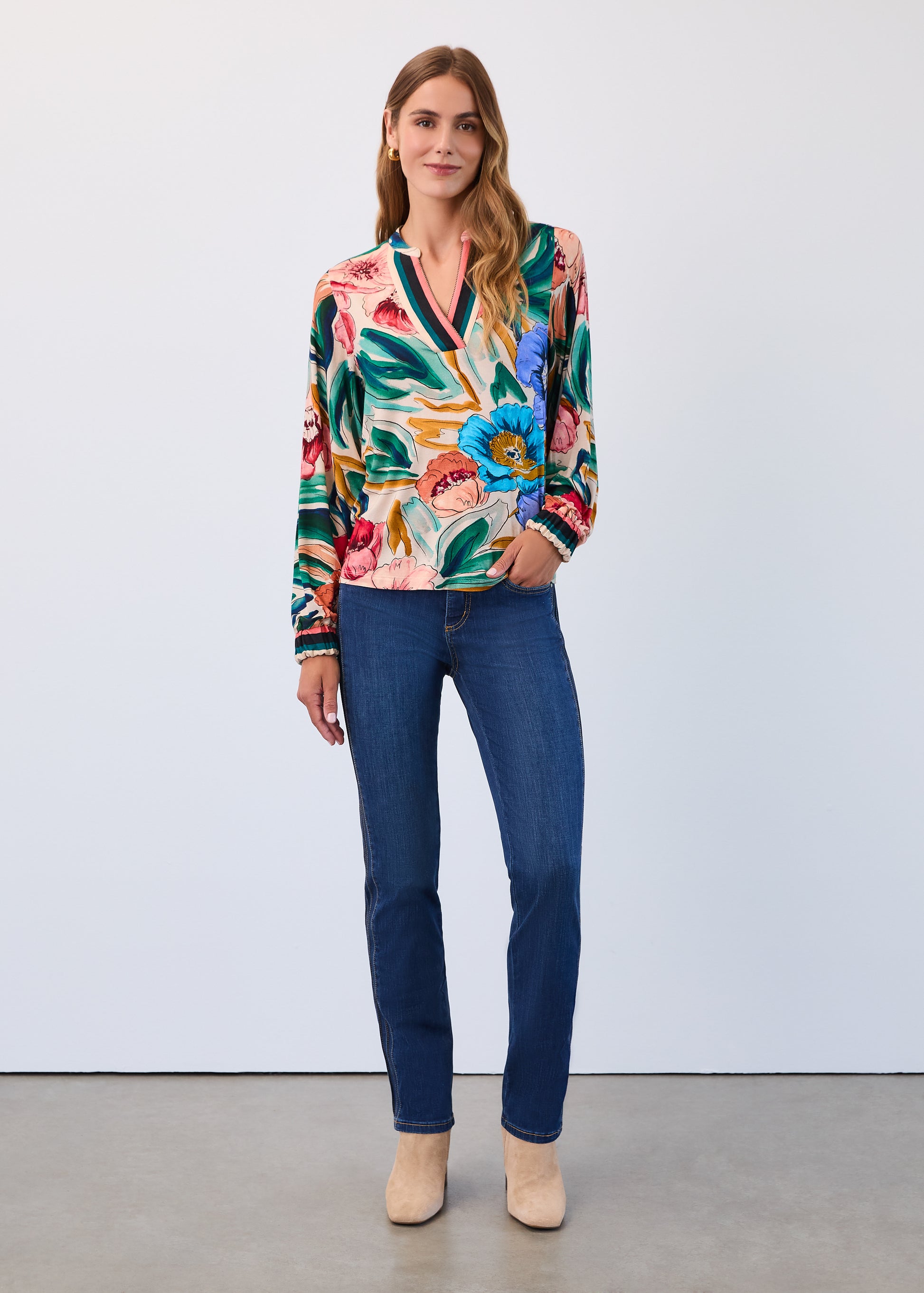Hannahs Of Erin | Erin Ontario | FDJ | Olivia Mid-Rise Straight Leg Jeans.FDJ Olivia mid-rise women’s jeans in dark wash denim featuring a classic fly front fastening, five-pocket styling, subtle vertical seam detailing for elongation, and a smoothing, shaping fit. Petite sizing available. Styled with a tucked-in blouse and ankle boots.dark wash with contrasting stitch