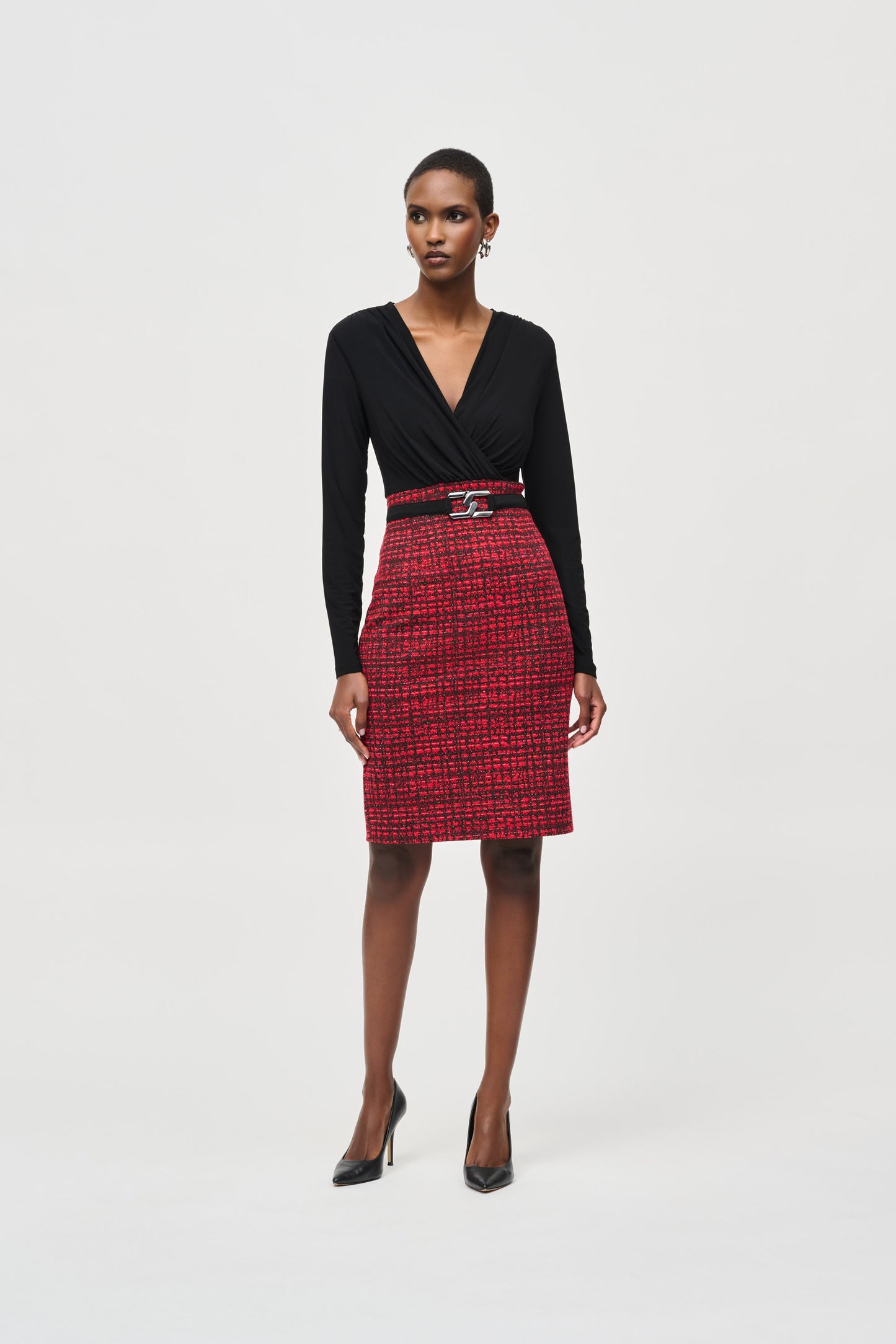 Hannahs of Erin- Erin Ontario-Joseph Ribkoff dress-243060. Long straight sleeves, featuring an red/black subtle plaid abstract patterned mini pencil skirt and wraparound silhouette bodice with a belt. Made from a blend of polyester and spandex for a comfortable fit, and complete with a back zipper. Ideal for semi-formal occasions or a stylish night out. Knee length.