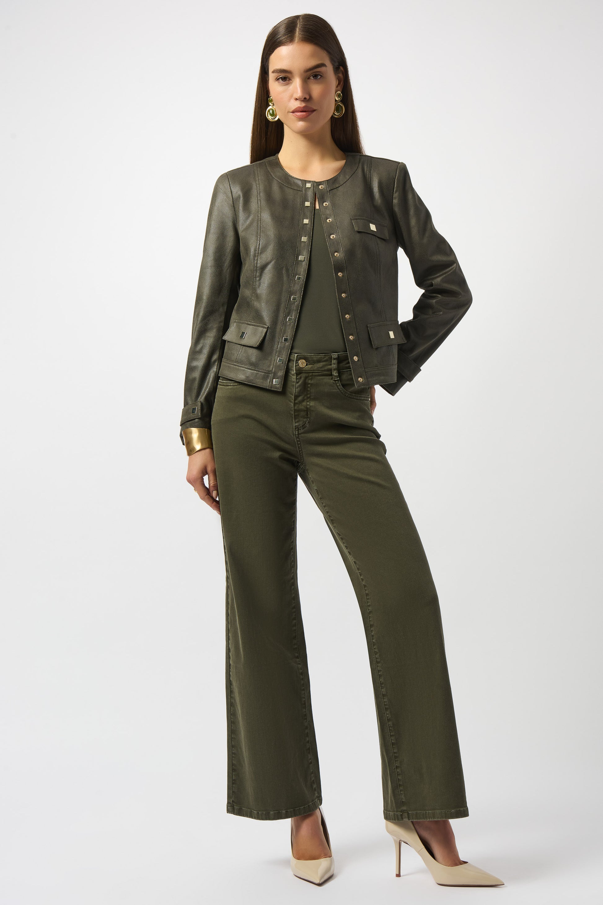 Joseph Ribkoff | Foiled Faux Suede Fitted Jacket | colour Avocado
90% Polyester, 10% Spandex
Foiled stretch faux suede
Crew neck
Long straight sleeves
Self tabs at cuffs
Square snap button front closure
Flap pockets with snap buttons
Unlined